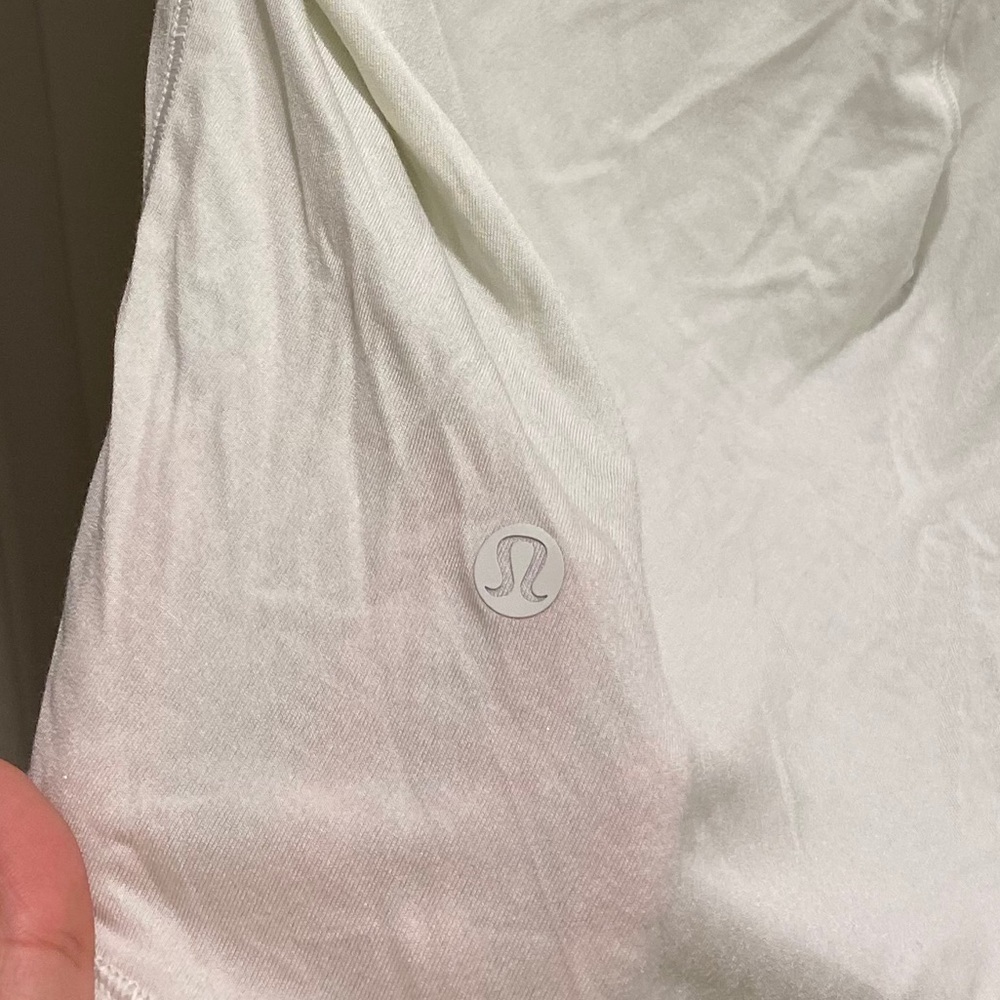 Lululemon light teal shirt.